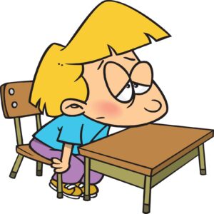 bored-clipart-a-boy-sitting-at-desk-with-his-head-on