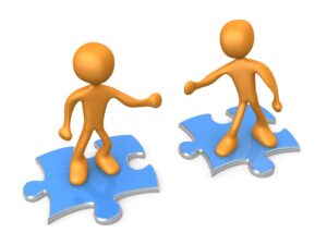 collaboration-clipart-two-people-are-running-on-puzzles