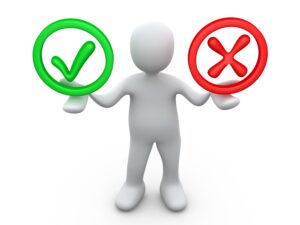 ethics-clipart-a-person-holding-two-green-and-red-check-marks