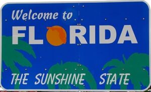 florida-clipart-a-blue-sign-with-palm-tree-and-that-says-welcome-florida